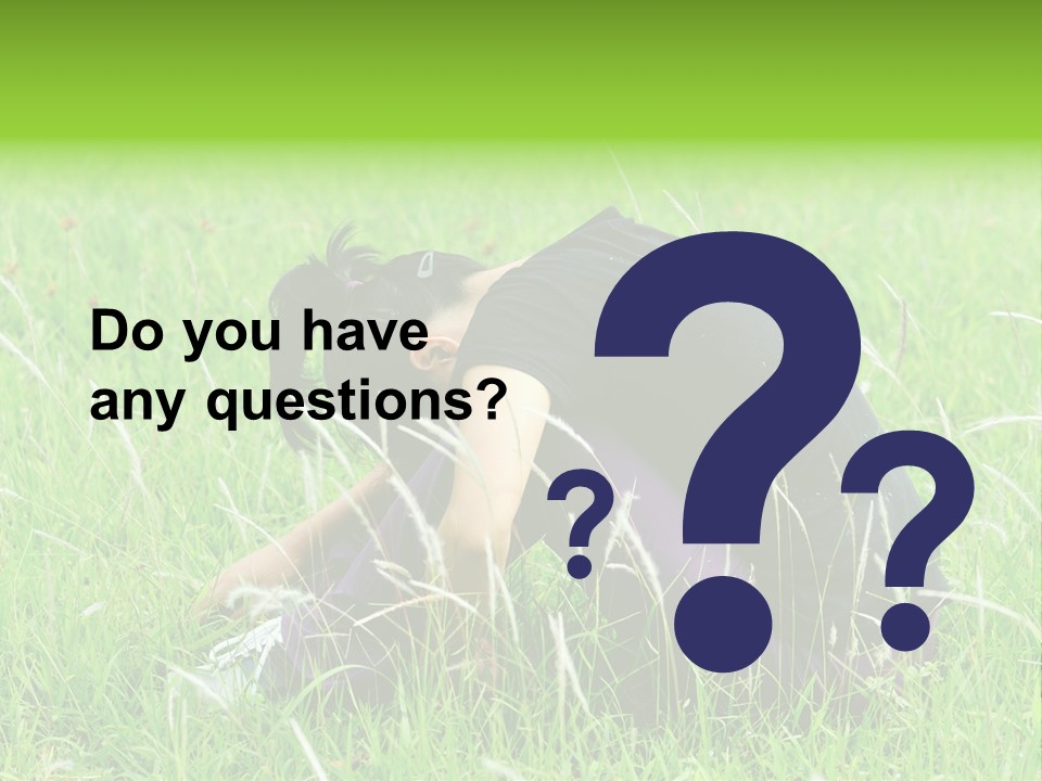 A Woman Sitting In The Grass With Her Head In Her Hands PowerPoint Template