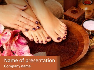 A Woman's Feet With A Manicure And Flowers PowerPoint Template
