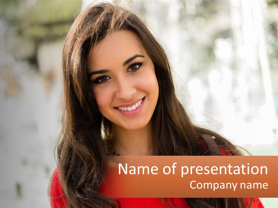 A Woman With Long Brown Hair Smiling At The Camera PowerPoint Template