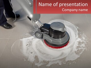 A Man Is Cleaning The Floor With A Machine PowerPoint Template