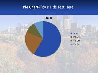 A City Skyline With A River In The Foreground PowerPoint Template