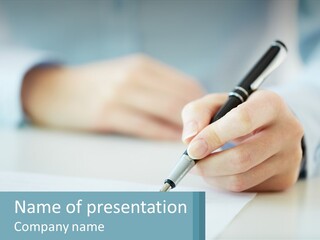 A Person Writing On A Piece Of Paper With A Pen PowerPoint Template