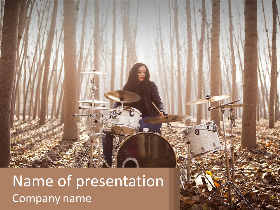 A Woman Is Playing Drums In The Woods PowerPoint Template