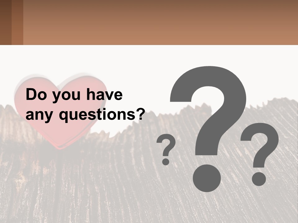 A Red Heart Sitting On Top Of A Wooden Table PowerPoint Template