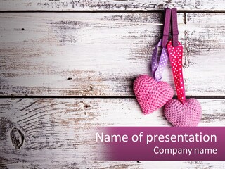 A Group Of Hearts Hanging On A Clothes Line PowerPoint Template