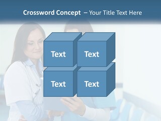 Two Women In Scrubs Are Looking At A Tablet PowerPoint Template