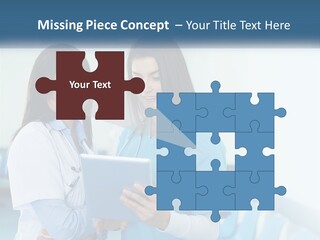 Two Women In Scrubs Are Looking At A Tablet PowerPoint Template