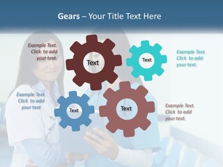 Two Women In Scrubs Are Looking At A Tablet PowerPoint Template