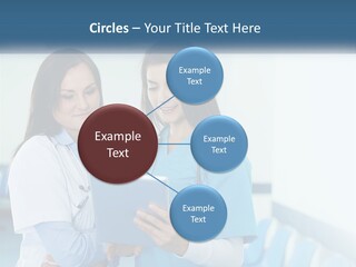 Two Women In Scrubs Are Looking At A Tablet PowerPoint Template