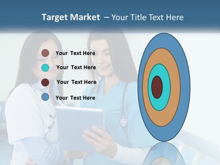 Two Women In Scrubs Are Looking At A Tablet PowerPoint Template