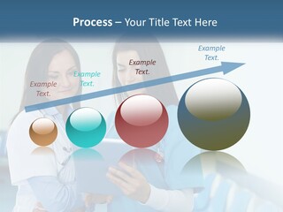 Two Women In Scrubs Are Looking At A Tablet PowerPoint Template