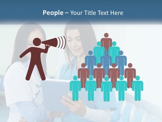 Two Women In Scrubs Are Looking At A Tablet PowerPoint Template