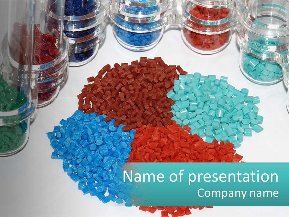 A Bunch Of Different Colored Rocks On A Table PowerPoint Template