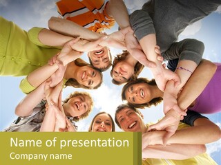 A Group Of People Standing In A Circle With Their Hands Together PowerPoint Template
