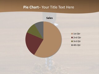 A Screw With A Hole In It On A Wooden Table PowerPoint Template