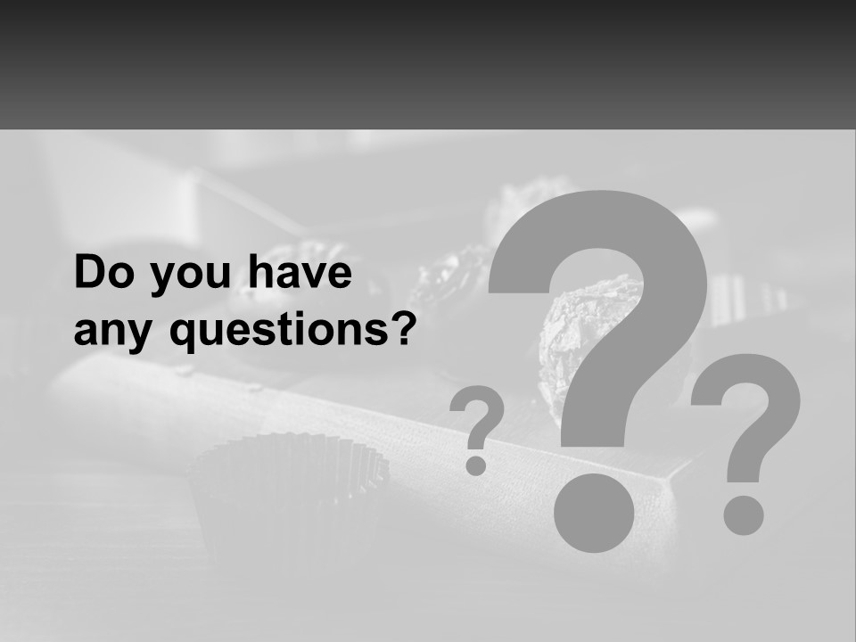 A Wooden Cutting Board Topped With Cupcakes And Muffins PowerPoint Template