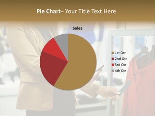 A Woman Looking At A Cell Phone In A Clothing Store PowerPoint Template