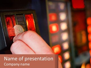 A Person Pressing A Coin Into A Slot Machine PowerPoint Template