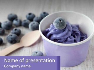 A Bowl Of Blueberries With A Spoon On The Side PowerPoint Template