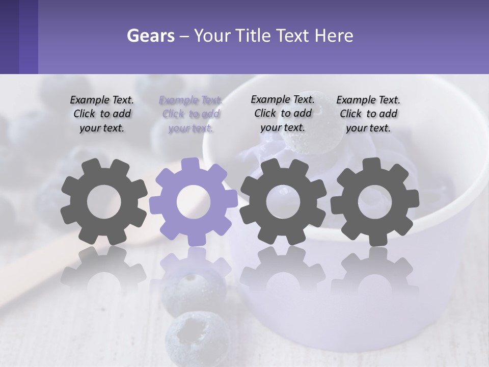 A Bowl Of Blueberries With A Spoon On The Side PowerPoint Template