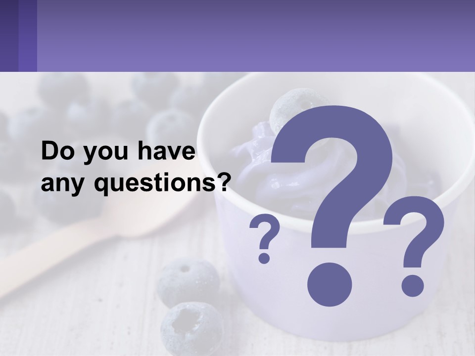 A Bowl Of Blueberries With A Spoon On The Side PowerPoint Template