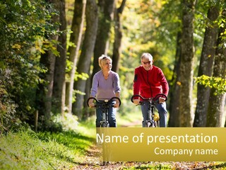 A Couple Of People Riding Bikes Down A Road PowerPoint Template