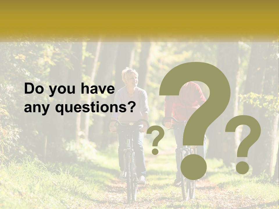 A Couple Of People Riding Bikes Down A Road PowerPoint Template