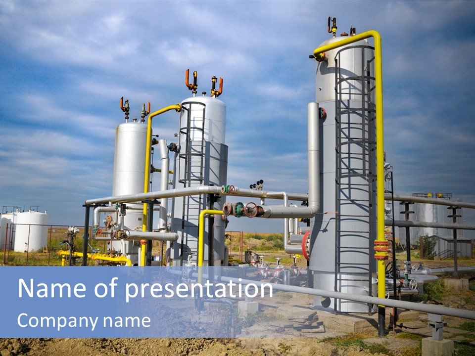 A Power Plant With Pipes And Valves On A Cloudy Day PowerPoint Template