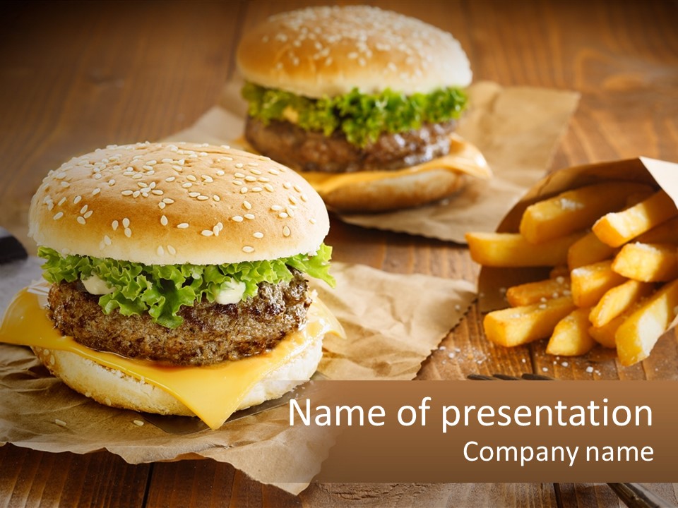 Two Hamburgers And Fries On A Wooden Table PowerPoint Template