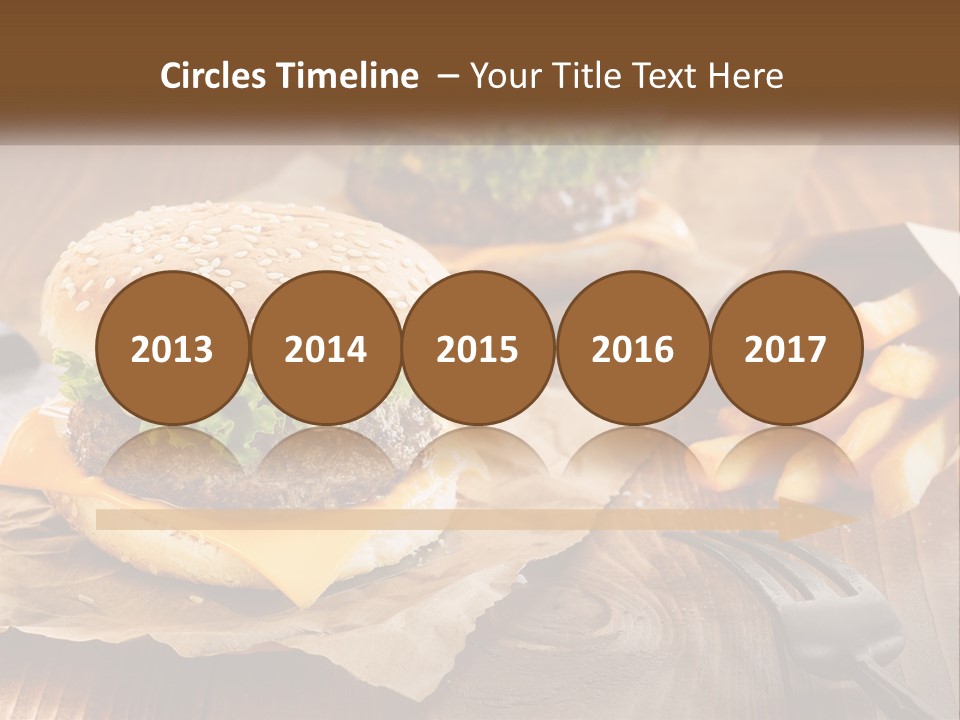 Two Hamburgers And Fries On A Wooden Table PowerPoint Template