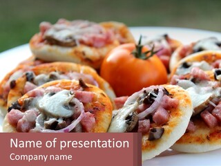 A White Plate Topped With Mini Pizzas Covered In Toppings PowerPoint Template