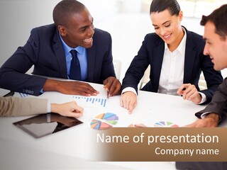 A Group Of Business People Sitting Around A Table PowerPoint Template