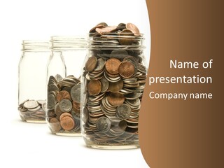A Jar Filled With Coins Sitting On Top Of A Table PowerPoint Template