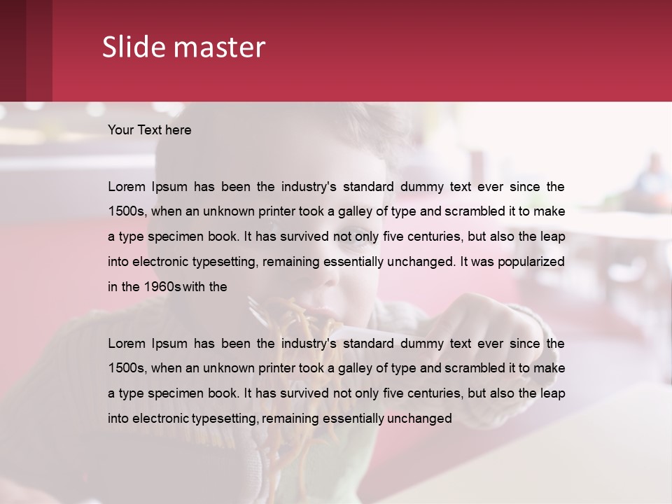 A Young Boy Eating Noodles In A Restaurant PowerPoint Template