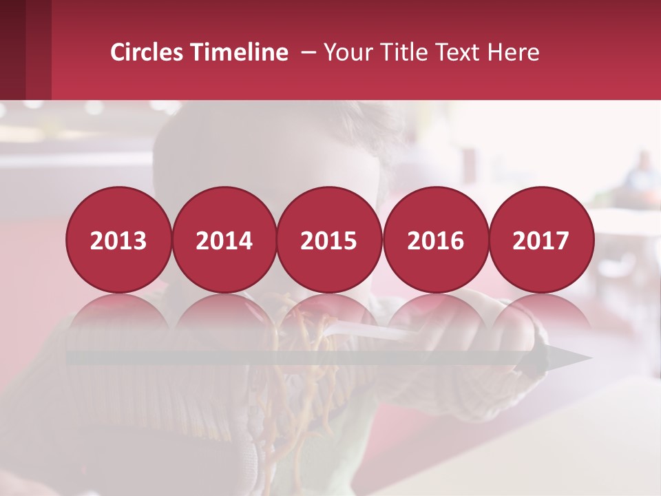 A Young Boy Eating Noodles In A Restaurant PowerPoint Template