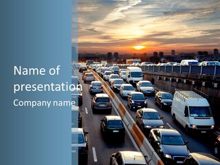A Highway Filled With Lots Of Traffic With A Sunset In The Background PowerPoint Template