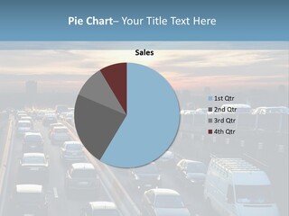 A Highway Filled With Lots Of Traffic With A Sunset In The Background PowerPoint Template