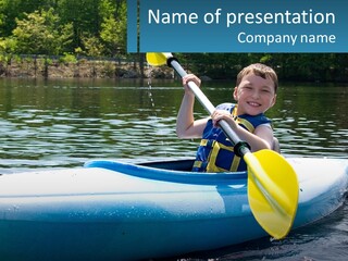 A Young Boy In A Blue Kayak With A Yellow Oar PowerPoint Template