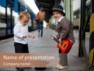 Two Young Boys Standing Next To Each Other Near A Train PowerPoint Template