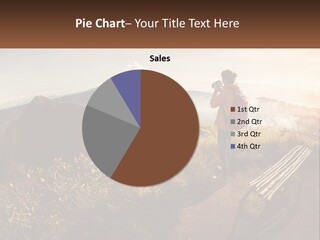 A Person Taking A Picture Of A Mountain With A Camera PowerPoint Template