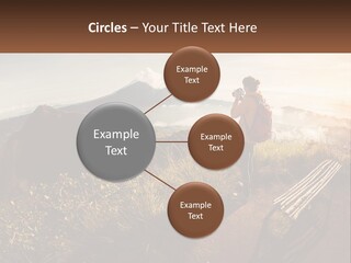 A Person Taking A Picture Of A Mountain With A Camera PowerPoint Template