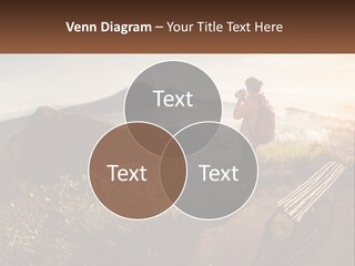 A Person Taking A Picture Of A Mountain With A Camera PowerPoint Template