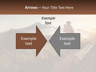 A Person Taking A Picture Of A Mountain With A Camera PowerPoint Template