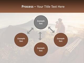 A Person Taking A Picture Of A Mountain With A Camera PowerPoint Template