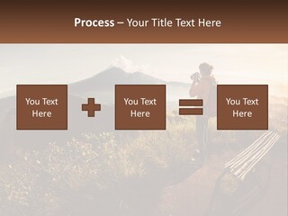 A Person Taking A Picture Of A Mountain With A Camera PowerPoint Template