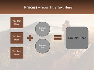 A Person Taking A Picture Of A Mountain With A Camera PowerPoint Template