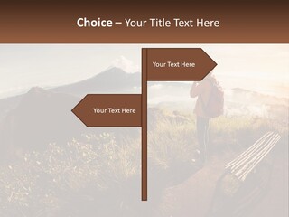 A Person Taking A Picture Of A Mountain With A Camera PowerPoint Template