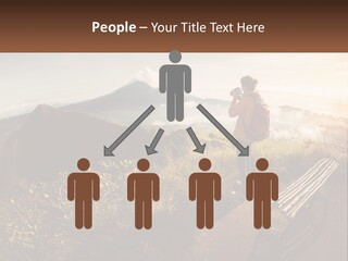 A Person Taking A Picture Of A Mountain With A Camera PowerPoint Template