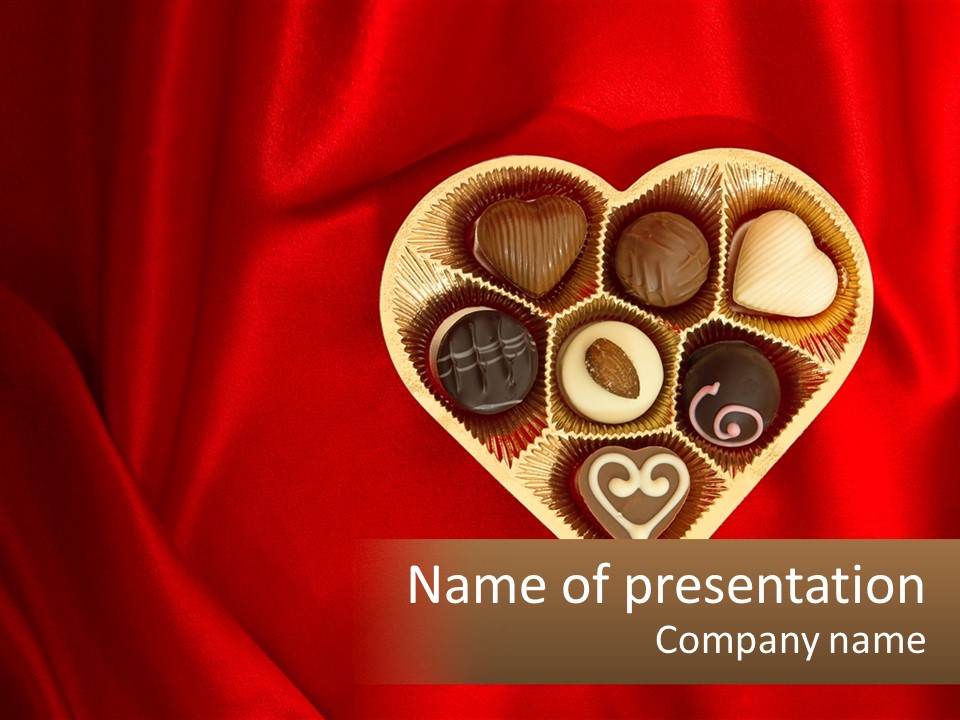 A Heart Shaped Box Filled With Chocolates On A Red Cloth PowerPoint Template