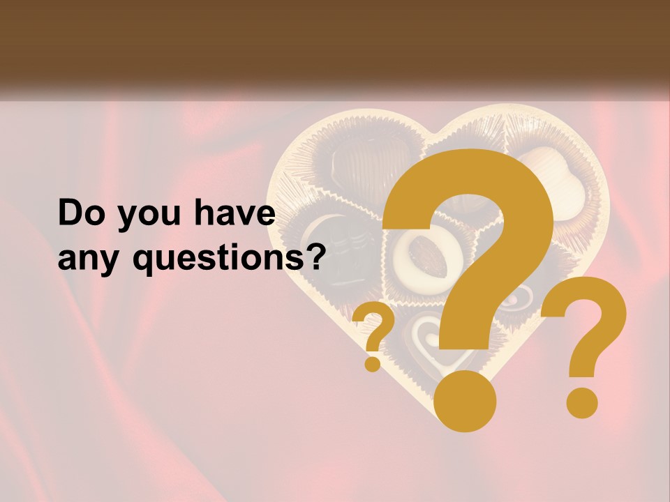 A Heart Shaped Box Filled With Chocolates On A Red Cloth PowerPoint Template